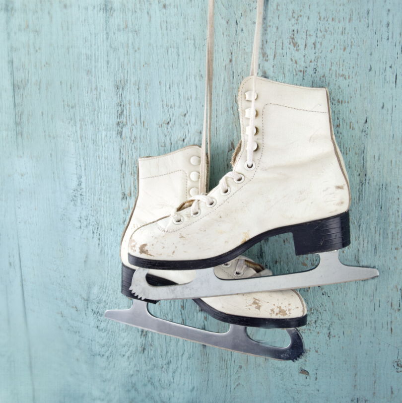 ice skates on a blue background
